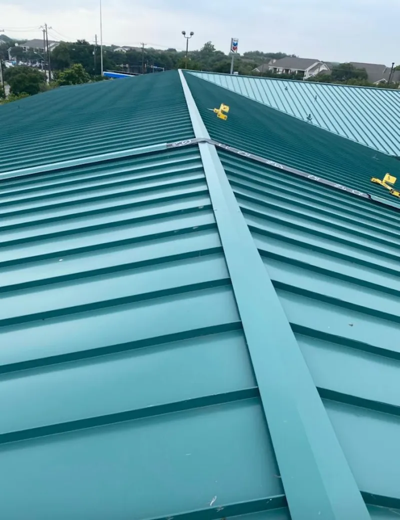 Green commercial metal roof ridge and valley for Metal Roof Repair in Box Elder